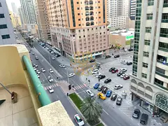 2 Bedroom with 2 Balcony+Wardrobe with GYM Pool Free with Open view on All Taawun street in Al Taaw
