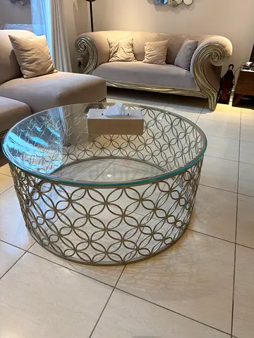 Negotiable Round Glass Top Coffee Table with Decorative Metal Base