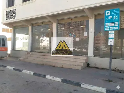 محلان كبيرين | يمكن دمجهما وفتح أي نشاط تجاري | المحل الأول: 60,000 درهم سنويًا | المحل الثاني (الكورنر): 70,000 درهم | المحلان مع بعض 120 الف درهم