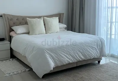 King-size upholstered bed frame with padded headboard - light beige