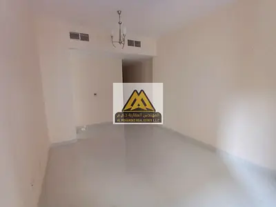 One-bedroom apartment for rent in Al Rawda 2, Sheikh Ammar Street, with a spacious layout and central air conditioning.