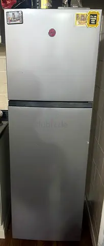Silver double-door refrigerator - good working condition