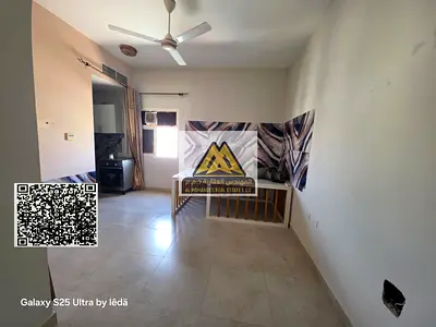 Studio for rent in Al Rawda 3, Ajman. Very spacious, semi-separated kitchen, central AC, prime location near all services. AED 18,000 in 6 payments.