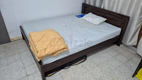Bed and cupboard