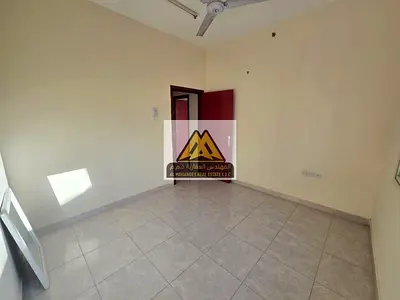 One-bedroom apartment with a living room in Al Alia, large space, split AC, balcony, 28,000 yearly, 4 payments, near Sheikh Mohammed bin Zayed Road, D