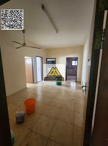 A spacious 1-bedroom apartment with a living room for annual rent in Al Nakheel 1 – Ajman. It features a balcony and a large layout, located near Ajma