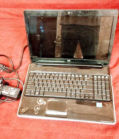 HP Laptop with Charger - Used (See Photos)