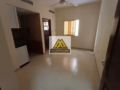 Studio for Annual Rent in Al Hamidiya 1 Ajman Semi-Separate Kitchen Central AC Prime Location Near Services