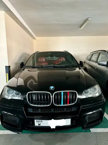 BMW X6M 2011 Fully loaded high-line. Black color. Red interior.