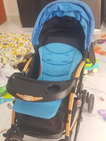 Blue baby stroller/pram in good used condition