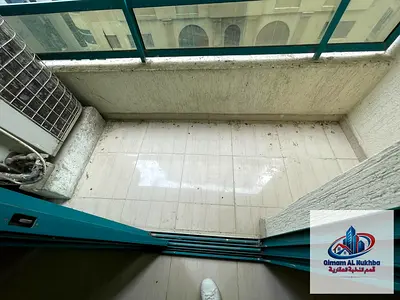 Beautiful 2BR apartment in Al Qasimia Al Nad with balcony and nice view, central AC & gas, flexible payment plan, maintenance covered by landlord.