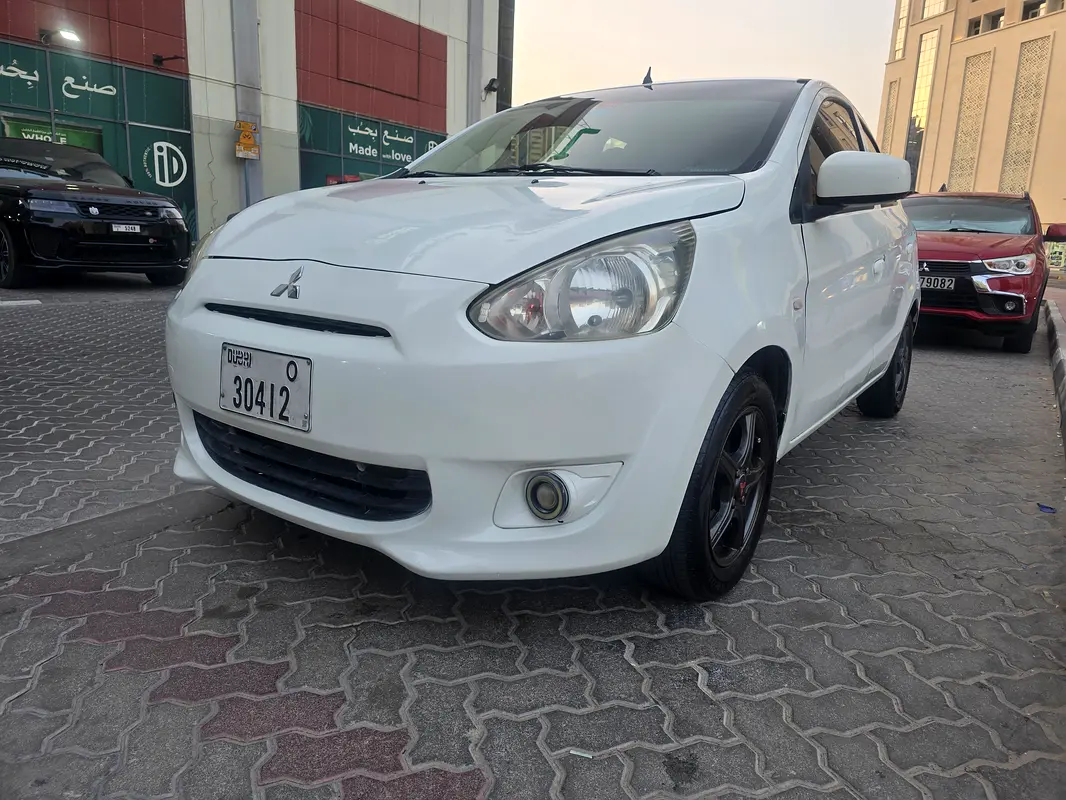 Mitsubishi Mirage 2014 — photo 1 of 8