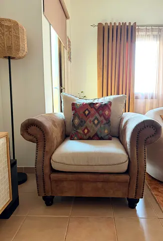 Single Brown Leather-Style Armchair with Cushion