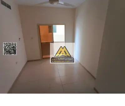 1BHK in Al Hamidiya 1, Ajman. Separate hall, balcony, central AC. Near Ajman University. AED 27,000 yearly, 4 payments. Lowest price.