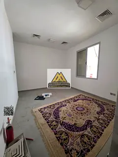 Studio Al Rawda 1 Ajman. Ground floor, spacious, semi kitchen, new building, central AC. AED 19,000