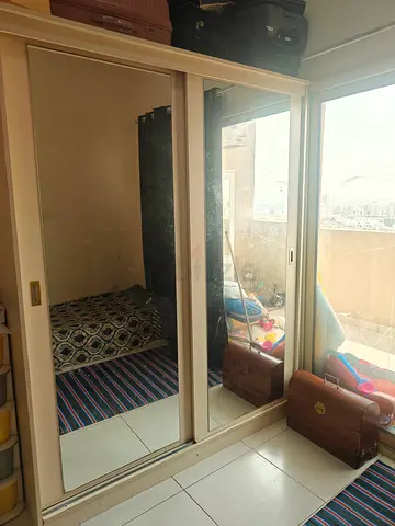 White Sliding Door Wardrobe with Mirror - Good Condition