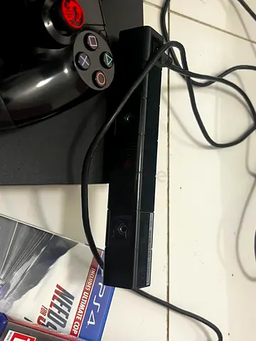 Sony PlayStation 4 with 3 DualShock Controllers, 5 Games and Camera - Good Used Condition