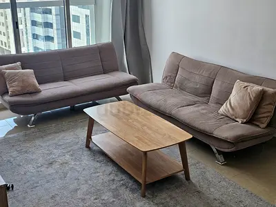 Pair of Convertible Sofa Beds with Coffee Table - Good Condition