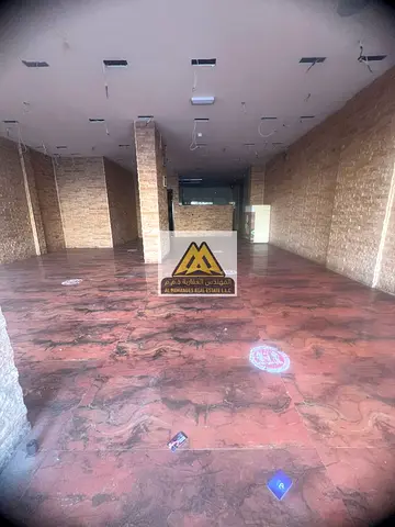 Commercial Shop for Rent in Al Nakhil – Ajman | Prime Location Near Ajman Corniche with Large Space