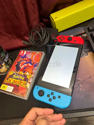 Nintendo Switch Original with Games (Pokemon, NBA and Mortal Kombat) and Charger