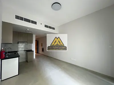 A distinctive apartment for annual rent in the newest and most luxurious Residence Towers in Al Amrah, Ajman, featuring a prime location, open view, a