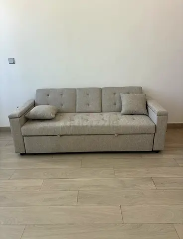 Convertible sofa bed with cup holder