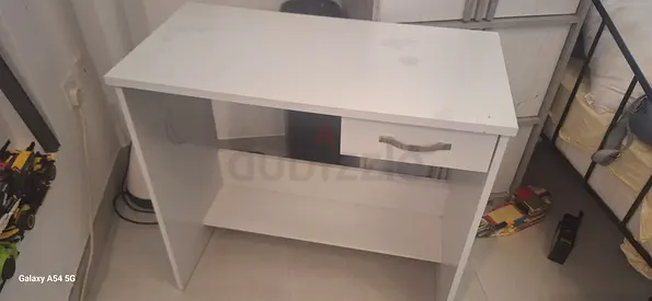 Small white study desk with drawer and shelf - good condition
