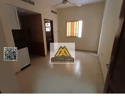 Studio in Al Hamidiya 1 Ajman. Semi kitchen, central AC. AED 17,000 yearly, 4 payments. Prime location, near all services, low price.