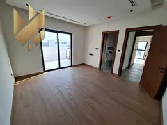 First-occupancy villa in Al Hoshi, Sharjah, featuring modern finishes and a beautiful contemporary d