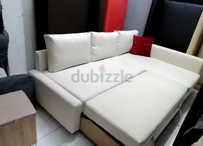 Beige L-shaped Sofa Bed with Storage — Good Condition