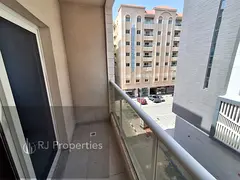 Brand new building - 1 BR apartment - balcony - coverd parking - spacious - for families