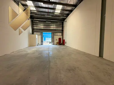 Warehouse for rent in Industrial Area 10, Sharjah, with an area of 2,000 sq. ft., located on a main road in a prime location.