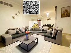 A luxurious 2-bedroom apartment with a living room for annual rent in Corniche Residence – Ajman, 