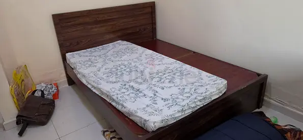 Single wooden bed frame with headboard – good condition