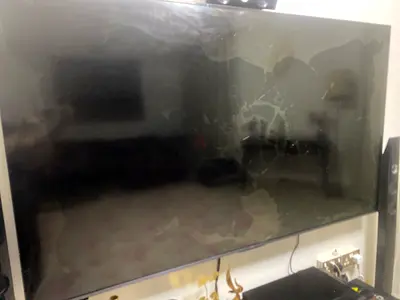 75-inch LED TV with cracked screen — for parts or repair