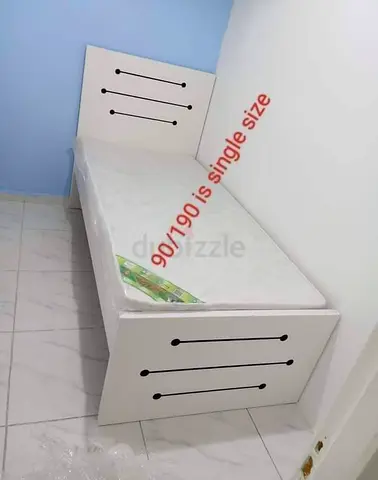 Brand new single bed with mattress
