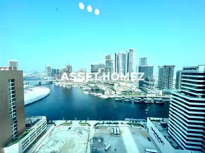 شقة بغرفتي نوم | الفن XIV14 في الخليج التجاري | إطلالة على القناة والبرج | الوصول إلى الشرفة