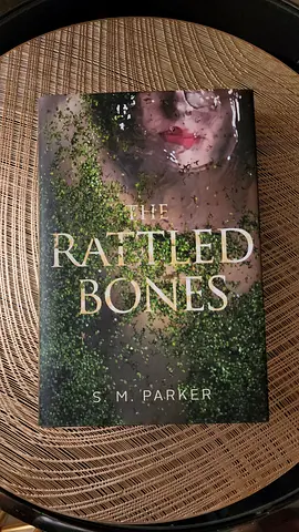 The Rattled Bones by S M Parker (hardcover)