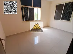A 1-bedroom apartment with a living room for annual rent in Al Nuaimiya 2 – Ajman, featuring a goo