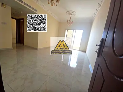 A luxury 1-bedroom apartment with a living room for annual rent in Al Hamidiya 1 – Ajman, featuring super deluxe finishing, a master bedroom with buil