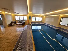 One bedroom and living room with balcony free gym pool and maintenance all year prime location near