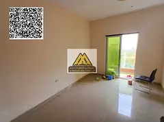 A 2-bedroom apartment for annual rent in Al Nuaimiya 2 – Ajman. It features a spacious layout, a c