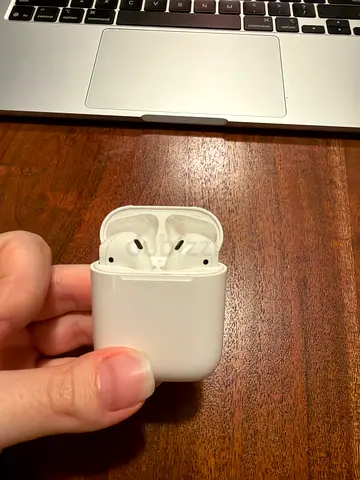 Apple AirPods (1st Gen) with Charging Case - Good Condition