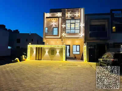 Luxury villa for sale in Al Zahia, prime location on a main street – registration and ownership fees included. 6 master bedrooms, majlis with large li