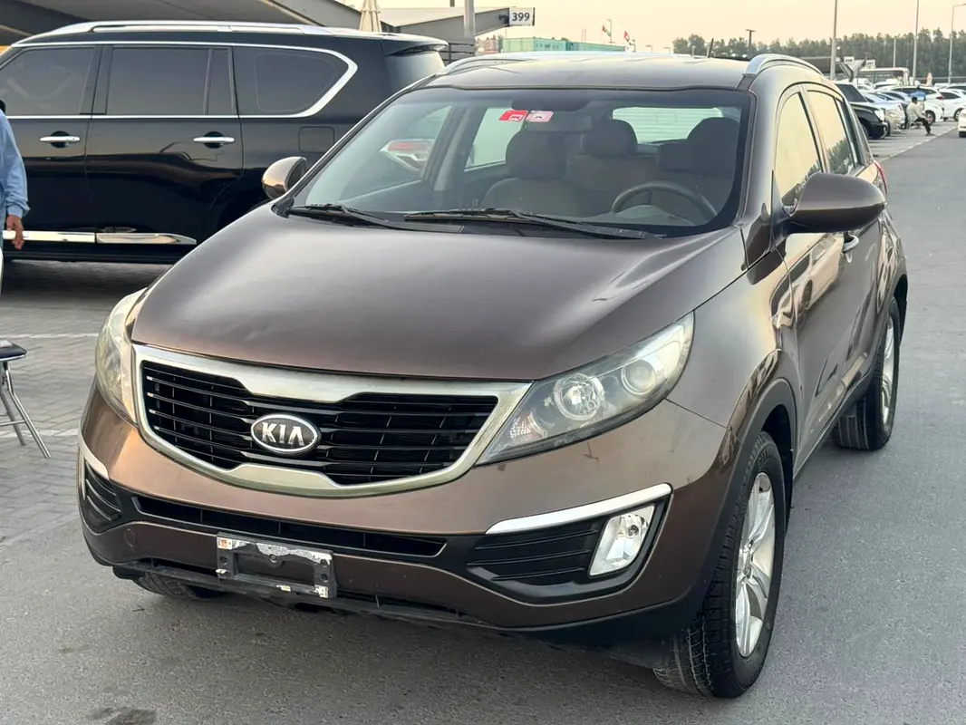 Kia Sportage 2013 — photo 1 of 12