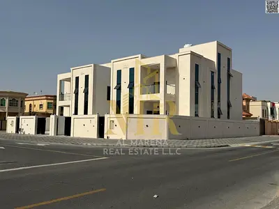 Own a luxurious residential and investment villa in Al Rawda 3, Ajman. Corner unit, two floors plus roof, central air conditioning, elevator, close to