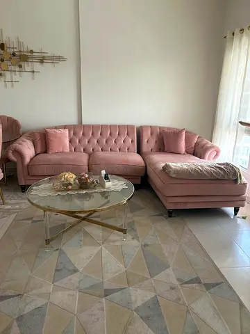 Light pink tufted 3-seater sofa with chaise lounge - good condition