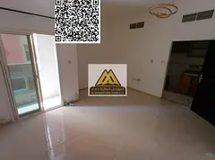 A studio for annual rent in Al Nuaimiya 2 – Ajman on King Faisal Street, featuring a separate kitc