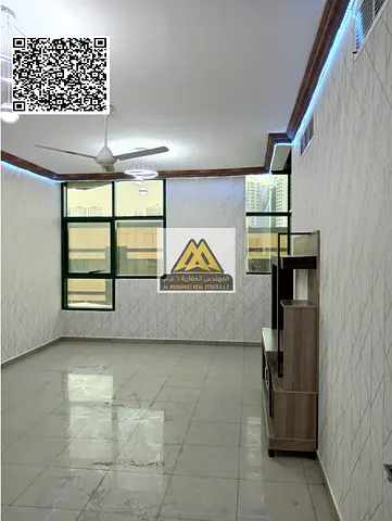 شقة غرفتين وصالة للإيجار في أبراج الراشدية 2 عجمان بإطلالة جميلة وبلكونة ومساحة مريحة وموقع حيوي قريب من جميع الخدمات