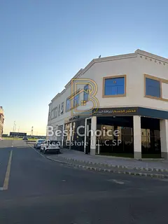 Al-Hawshi building, corner lot on two streets Second plot from Maliha